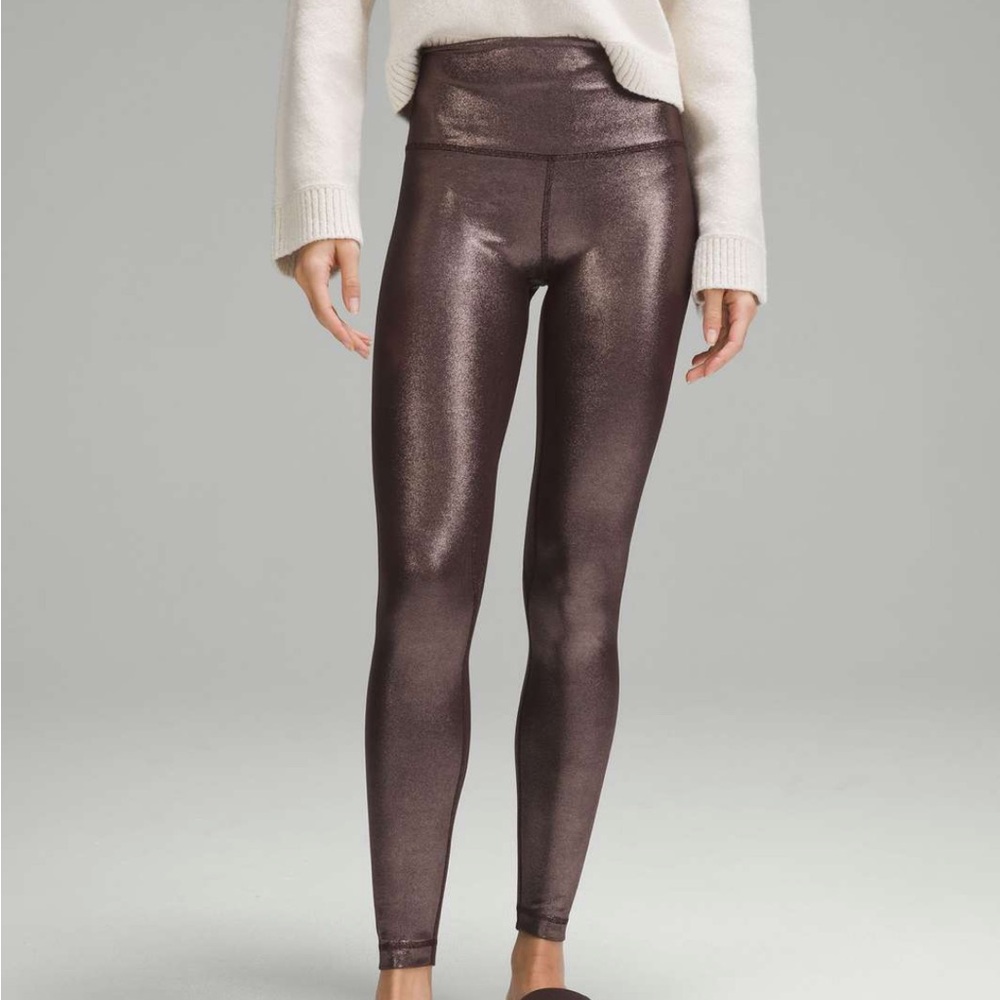 Lululemon copperShiny Metallic Leggings
Never worn high waisted 4 full length